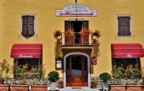 Hotels in Comano